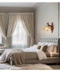 LMAPLUMP Wall Lamp Wall Sconce Classical European Vintage Antique Zinc Alloy Flower Glass Shade Crystal Accents Light for Bedroom Bedside illuminating a stylish bedroom.