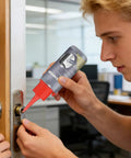 Man applying Lock Lubricant Powder For Keyholes And Lock Cores, Friction Free Graphite Lube For Doors, Drawers And Cabinets on door lock