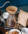 Solid Daily Driver Number Four Cone Coffee Filter Papers brewing coffee with clean water pouring, unbleached paper filter in use.
