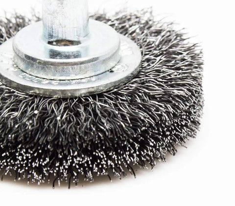 Heavy Duty One And One Half Inch Grinder Mounted Crimped Wire Wheel For Drill With One Quarter Inch Shank For Rust Removal, close-up view