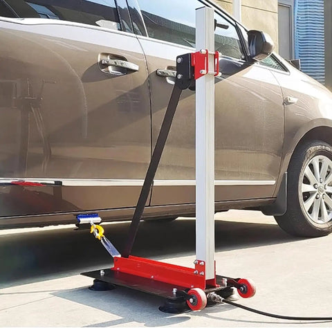 Pneumatic Powered Sheet Metal Dent Pulling Tower Kit for Auto Body Shaping and Alignment next to a car