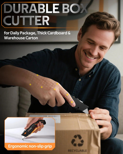 VOTREK orange retractable box cutter knife with ergonomic non-slip grip cutting a cardboard box (front view)
