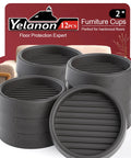 Twelve Piece Heavy Duty Rubber Furniture Pads, 2 Inch Anti Skid Coasters To Lock Down Couches And Tables, tight grip floor protectors in black.