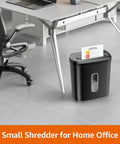 Built Tough Cross Cut Shredder For Paper And Credit Cards With Bulletproof P Four Security And Zero Drama Auto Shut Off In Sleek Black beside office chair.