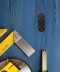 8 Piece Black Zinc Alloy Folding Table Flip Top Hinges With 180 Degree Round Edge Design on blue wood background with tools