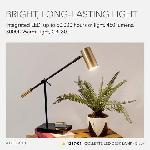 Lit 7W LED Desk Lamp With Qi Wireless Charging Pad And USB Port, adjustable arm, black and brass, on wooden desk