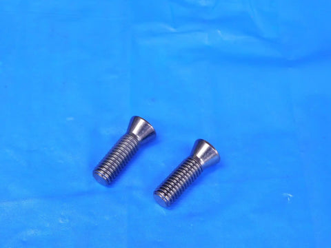 Shop Ready 2 Piece Torx Screw Hardware Set Featuring Tough TA Spade Drill Holder And Solid Mounting Brackets For Job Site Repairs And Weekend Warrior Builds, showing two metal Torx screws on blue surface.