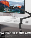 Badass Low Profile Microphone Boom Arm Stand For Gaming Streaming Podcasting With Smooth Swivel And Anti Vibration Cushion Mount in matte black.