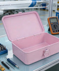 Badass Pink Metal Toolbox With Reliable Locking Latch Built Tough For Your Sweet Ride And Garage Grinds To Keep Every Wrench And Drill Perfectly Locked And Ready, open in workshop.