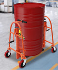 Rock Solid Furniture Moving Kit With 1300 Lb Rating Steel Slider Pads on a rolling cart moving a red barrel.