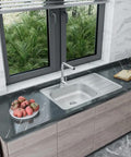 Topmount Kitchen Sink 33x20 Inch Stainless Steel Left Side One Hole For Single Faucet Handle Satin Finish With Sound Dampening Rubber Pad Built To Last And Easy To Clean installed in a modern kitchen setting.