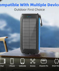 Go-To Ultra Portable 49800mAh Solar Charger Power Bank With Type C And Dual USB Ports on outdoor table
