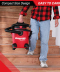 Person carrying All In One 5 Gallon 4.5 HP Wet Dry Vacuum With Attachments For Home Garage Car And Workshop Portable Heavy Duty Vacuum 3 In 1 Suction Blower Function For Home Projects on stairs