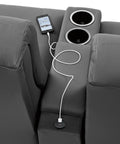 Recessed USB Power Grommet For Sleek Desk And Sofa Setup Featuring Built In Dual Fast Charging Ports With Totally Hidden Cord Routing For A Clean Game Vibe on a grey sofa.