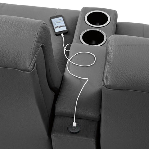 Recessed USB Power Grommet For Sleek Desk And Sofa Setup Featuring Built In Dual Fast Charging Ports With Totally Hidden Cord Routing For A Clean Game Vibe on a grey sofa.