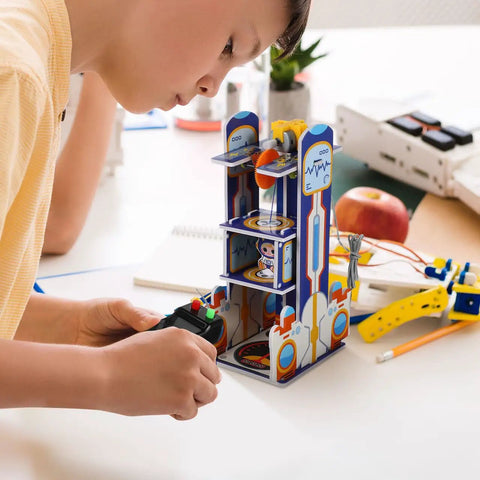 Hands On DIY STEM Elevator Project For Kids Age Five Plus A Fun Engineering Puzzle Kit With Step By Step Guide To Build A 3D Elevator Model Learn Physics And Critical Thinking Through Creative Play, child playing