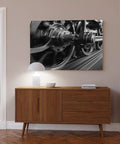 Speeding Steam Locomotive Wheels Black And White Transport Canvas Poster displayed in living room above wooden cabinet 24x36 inch
