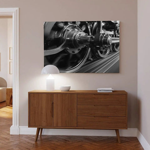 Speeding Steam Locomotive Wheels Black And White Transport Canvas Poster displayed in living room above wooden cabinet 24x36 inch