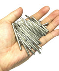 Hand holding 52 Piece 4Mm By 50Mm Dowel Pins Set In 304 Stainless Steel Built For DIY Shelves And Bunk Beds M4 Dowel Pins