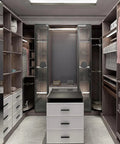 Modern closet with dark wood shelves and white drawers, showcasing storage options without installed handles. Ideal for hidden grip handles.