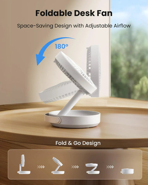 Foldable Desk Fan With LED Night Light 6.8 Inch Wireless Portable Fan on wooden table showing 180-degree adjustable airflow feature