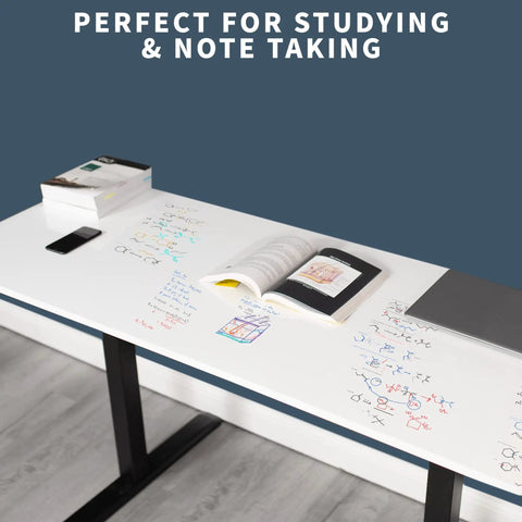 Super Smooth White Corner Standing Desk With Dry Erase Surface L Shaped Sit Stand Workstation 83 By 60 Inches displaying notes and books.