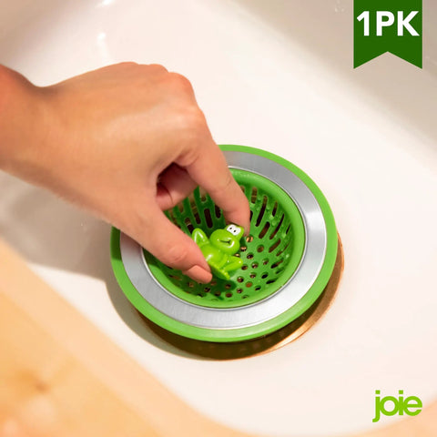 Person placing Ribbit Frog Kitchen Sink Strainer Basket 4.5 Inch Fits All Standard Sinks Stainless Steel Green Frog Drain Cover