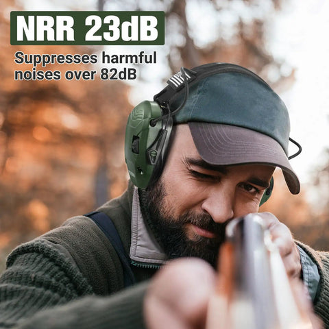 Man wearing Range Ready 23dB Shooting Earmuffs With Gel Ear Pads, Slim Active Noise Reduction And Sound Amplification For Gun Range And Hunting Green Requires 2 AAA Batteries Not Included, aiming a rifle outdoors.