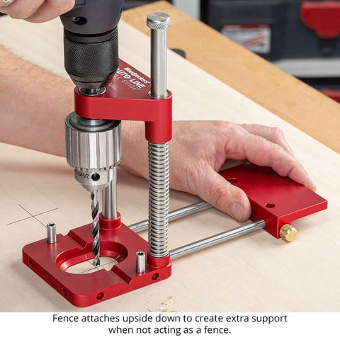 Auto Line Drill Guide Portable Drill Guide for Perpendicular Holes Up to Two Inches with Laser Centerlines in use on wood