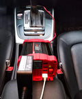 Rock Solid 300W Car Power Inverter DC 12V To 110V AC Vehicle Adapter Converter with USB ports in car center console.
