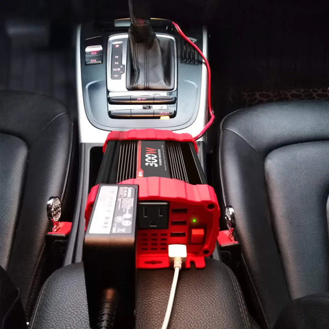 Rock Solid 300W Car Power Inverter DC 12V To 110V AC Vehicle Adapter Converter with USB ports in car center console.