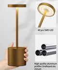 Gold Cordless Rechargeable Table Lamp With 5000mAh Battery, USB Powered Desk Light In Metal Aluminum Housing, held in hand
