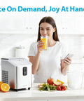 Countertop Ice Maker Rapid Bullet Ice In Six Minutes, 26Lb/24H Capacity, Two Ice Cube Sizes, woman in kitchen, stainless steel