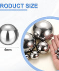 Hand holding 6mm 316L stainless steel bearing balls against larger spheres, labeled 100 Pcs 6Mm 316L Stainless Steel Bearing Balls G200 Precision For Bearings Bicycles Casters Automotive Parts And DIY Projects Mirror Polished Finish Heavy Duty Corrosion And Wear Resistant.