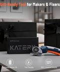 Katerk Cordless Electric Box Cutter With Safety Lock And Led Light on a table beside gift boxes, showcasing its sleek design.
