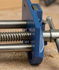 Close-up of Premium 7 Inch Carpentry Bench Clamp With T Handle Workbench Vise Threaded Screw and durable blue cast iron body.
