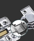 Close-up of stainless steel hydraulic cabinet door hinge with quiet buffer damping smooth soft close action for cabinets.