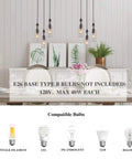 Dining room setup with three light wooden pendant light with height adjustable clear bottle glass shades, industrial farmhouse style.