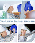 Worker installing Heavy Duty Dust Collection Hose 2.5 Inch By 10 Ft Flexible Clear PVC Fume Hose With Clamp on small machinery