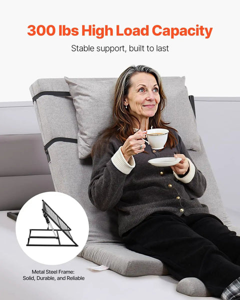 Woman enjoying tea in a cozy sweater on a Premium Electric Adjustable Bed Backrest With Thick Foam For Reading Relaxing Or Sleeping, 300 Lbs Capacity, Remote Control, Fits All Mattresses, Perfect For Pregnant Moms Seniors And Patients.