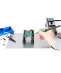 Hands Free Probing Kit With Four SQ10 Probes And Test Wires For Your Electronics Workbench in use for circuit debugging.