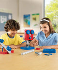 Hands On Simple Machines STEM Kit For Kids And Classrooms With Pulleys And Gears Engineering Building Sets Real Working Models 63 Durable Pieces Explore Physics Concepts And Build Problem Solving Skills kids building pulleys and gears at classroom table