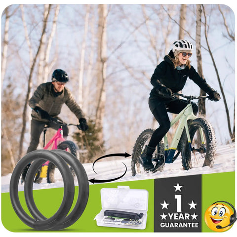 Cyclists riding with 20x3.0 Fat Bike Inner Tubes 2 Pack With 32mm Schrader Valve Premium Butyl Rubber Puncture Resistant Replacement Tubes For Electric Fat Tires Includes Repair Kit