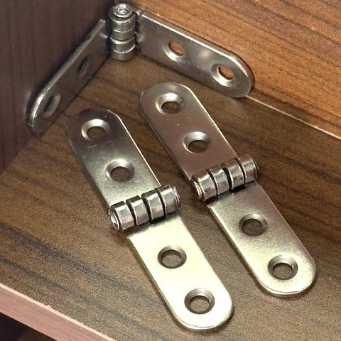 Heavy Duty Iron Folding Door Hinges 6 Pack With Rust Resistant Finish for cabinets and decor, shown on wooden surface