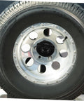 Spare Tire Bolt Clamp For Easy Replacement And Secure Fit On Honda CRV shown installed on a car wheel with chrome rim