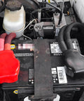 Heavy Duty Car Battery Terminal Kit With Four Piece 3 8 Inch Pure Copper Wire Lugs And Heat Shrink Tubing Positive Negative Cable Ends attached to battery.