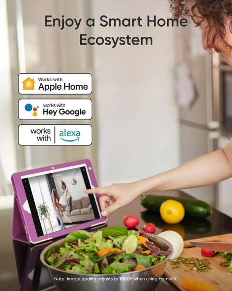 Person using tablet to control smart home with 4K Indoor Security Camera With AI Auto Tracking And Night Vision For Baby And Pet Monitoring.