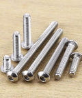 1/4-20 x 1 Button Head Socket Cap Screws In 304 Stainless Steel 18-8 With Bright Finish Allen Hex Drive Fully Machine Thread Pack Of 25 Heavy Duty Hardware For Auto Gear And DIY Projects. Screws arranged on wooden surface