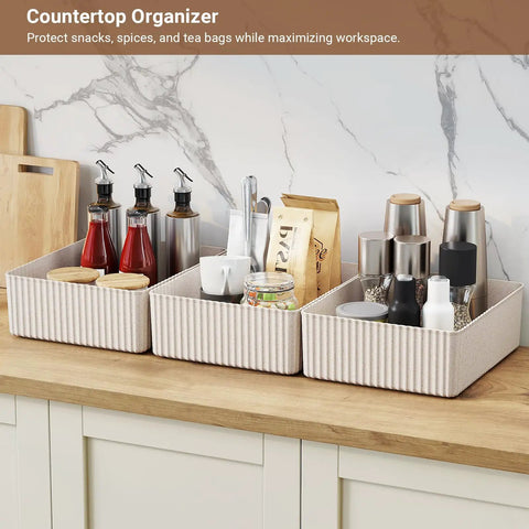 Kickass Plastic Storage Bins With Lids Full Set three ivory stackable organizers on kitchen countertop for spices and snacks.