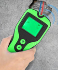 Electronic Wall Finder Detects Wood Metal Studs and Live Wire held in hand near wall showing LCD display.